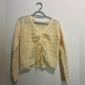 Yellow loose knit sweater